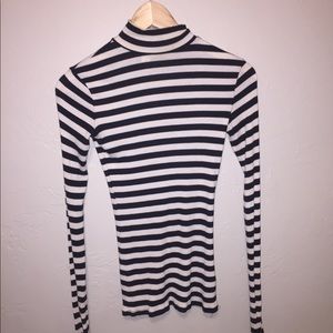 tight turtle neck sweater